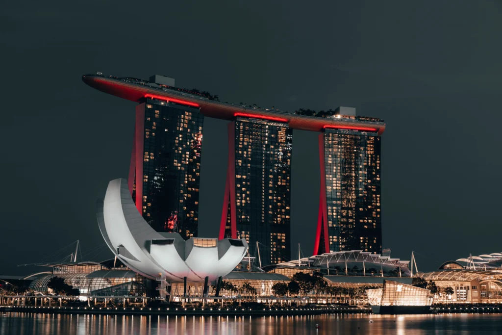 The Marina Bay Sands hotel and ArtScience Museum are lit up at night in Singapore.