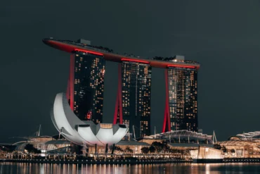 The Marina Bay Sands hotel and ArtScience Museum are lit up at night in Singapore.