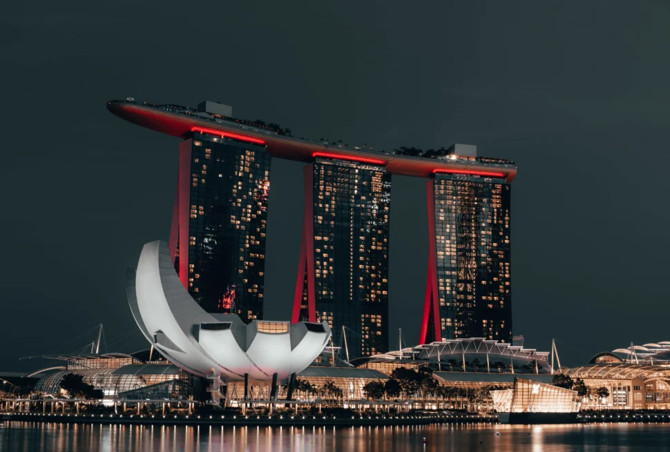 The Marina Bay Sands hotel and ArtScience Museum are lit up at night in Singapore.